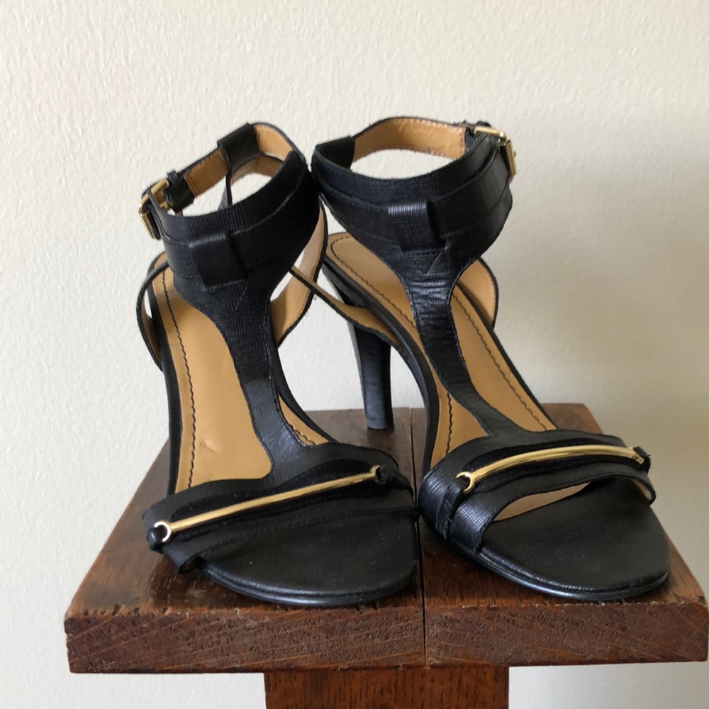 Nine West ankle strap heels. Size 7. Some wear. See photos. Black and gold.
